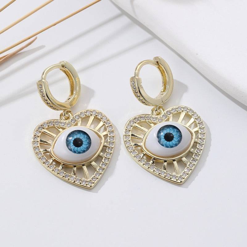 Pendientes de ojo de demonio con seis estrellas de Fashion Love