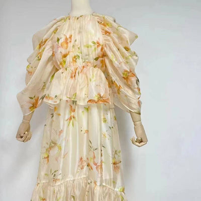 Robe mi-longue à volants et col licou à fleurs Nichele