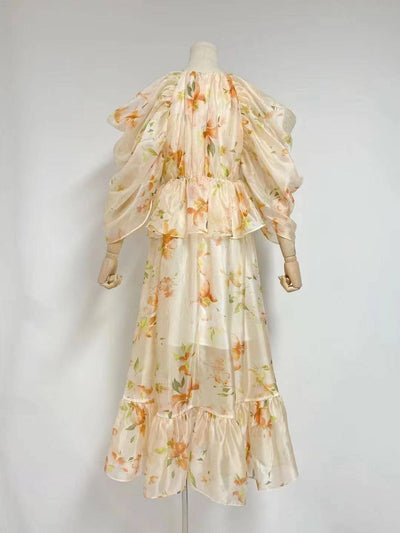 Robe mi-longue à volants et col licou à fleurs Nichele