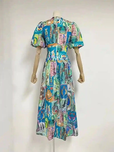 Vestido midi bohemio con estampado floral y mangas abullonadas de Marina