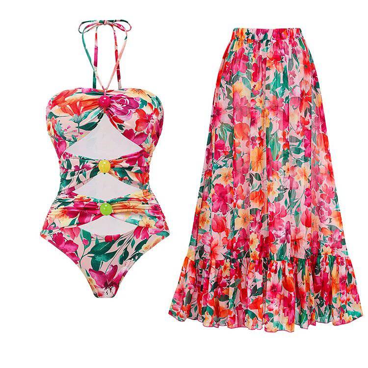 Maillot de bain fleuri à découpes et col licou Julia avec jupe fleurie