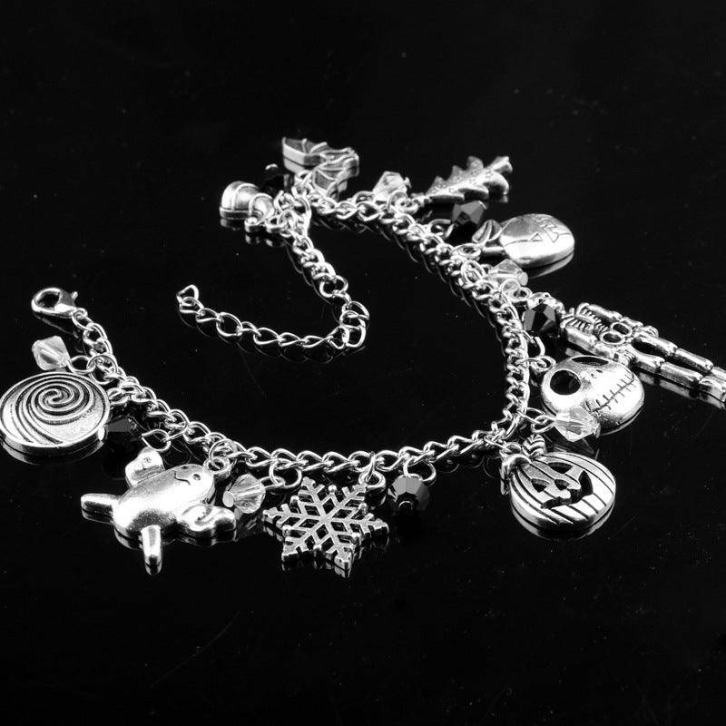 Pulsera con dijes y encaje variado