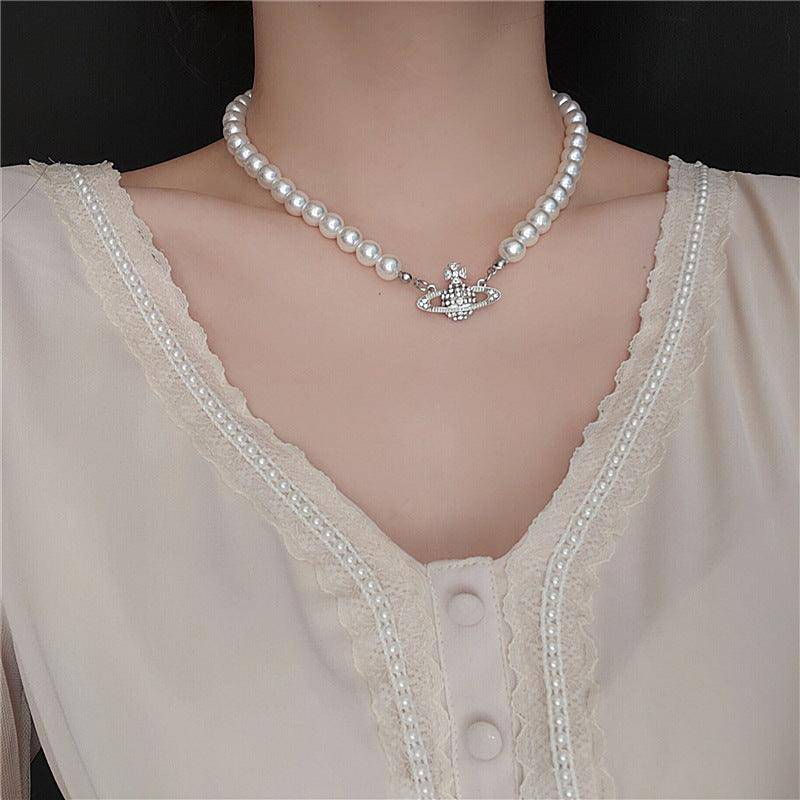 Deonne Saturn Pearl Necklace