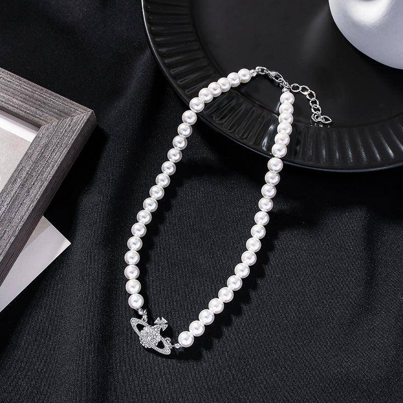 Deonne Saturn Pearl Necklace